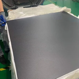 Factory-supplied dark woven carbon-fiber sheet